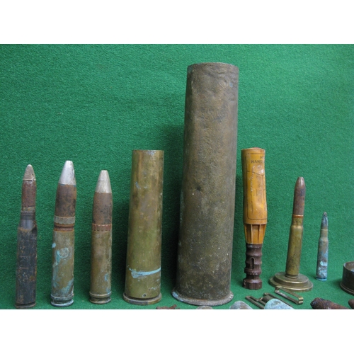 264 - Box of wartime ordnance and shell cases etc together with a brass buckle