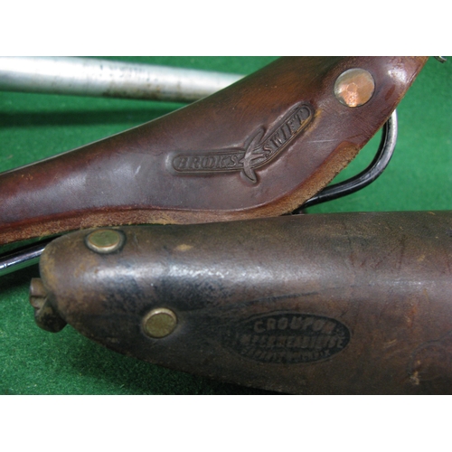 273 - Two leather bicycle saddles to comprise: Brooks Swift and an Ideale No. 23562 together with an unnam... 