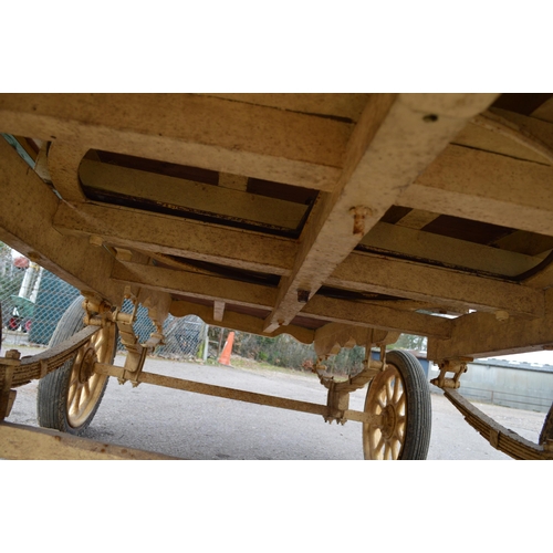 299 - Bow top gypsy caravan with green canvas roof, ornate floral tapestry to underside of roof, currently... 