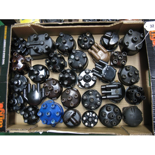 32 - Two boxes of approx fifty five assorted mostly new old stock distributor caps for 4, 6 and 8 cylinde... 