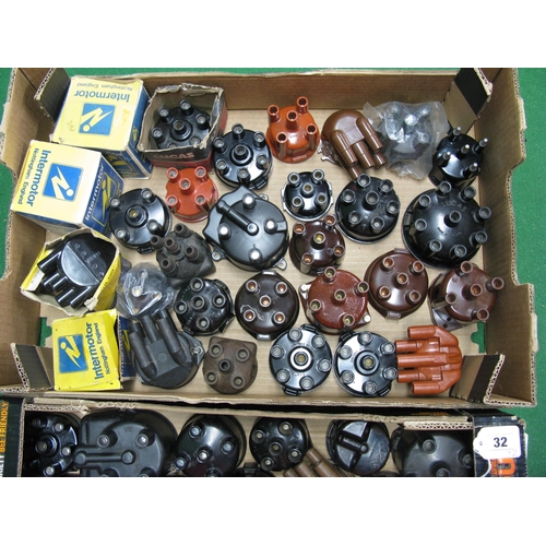 32 - Two boxes of approx fifty five assorted mostly new old stock distributor caps for 4, 6 and 8 cylinde... 