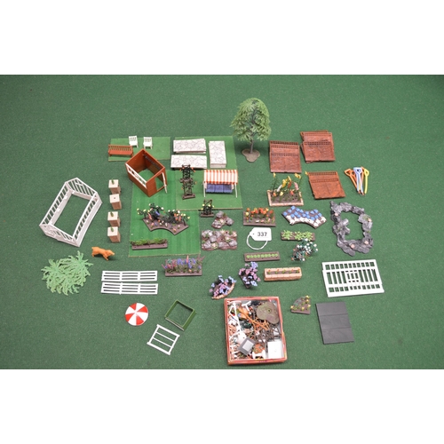 337 - Quantity of Britains plastic model garden items to include: flower beds, pathways, lawns, furniture ... 