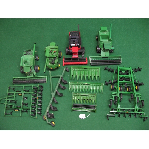 344 - Two boxes of Ertl diecast and plastic combine harvesters and trailer implements (some parts may need... 