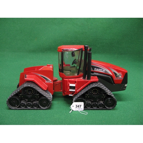 347 - Large diecast Farmall 806 tractor from CNH America LLC and a Case Quadtrac STX 500 Collectors Editio... 