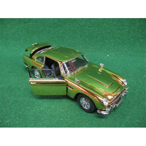 359 - Danbury Mint diecast and plastic model of James Bond's Aston Martin DB5 in gold with many moving par... 