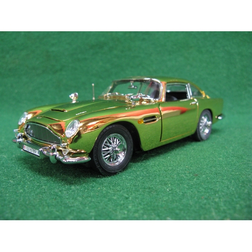 359 - Danbury Mint diecast and plastic model of James Bond's Aston Martin DB5 in gold with many moving par... 