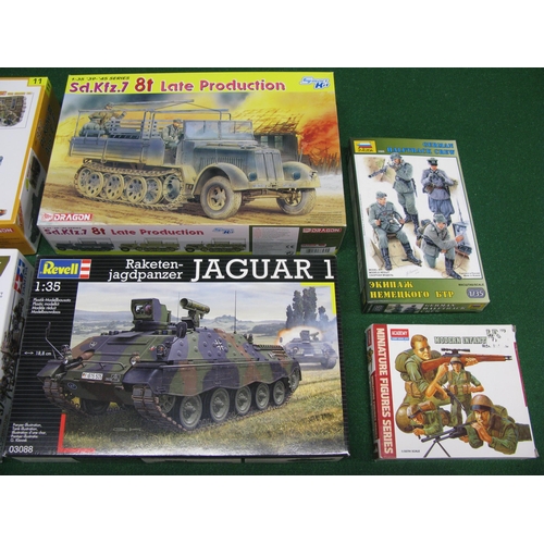 362 - Box of unmade plastic kits of military vehicles and personnel from Dragon, Tamiya, Revell, Academy a... 