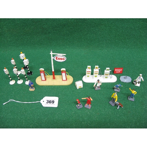 369 - Quantity of metal and plastic petrol pumps, traffic lights, figures, signs etc from Dinky, Corgi etc