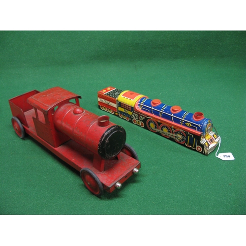 380 - Two tinplate Carpet Trains, a mid 20th century Lines Brothers four wheel pull along LMS steam locomo... 