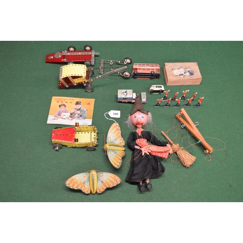 390 - Mixed toy lot to include: Pelham Puppet - Witch, quantity of Chinese Meccano, metal bandsmen, vehicl... 