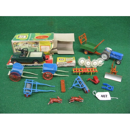 407 - Box of items from Britains to include: incomplete boxed military Land Rover, carts, implements, trac... 