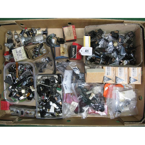 41 - Box of electrical switches, horn buttons, door plungers, plastic knobs, Jaguar V12 rotor arms etc