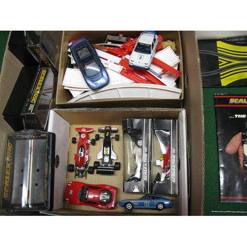 410 - Five boxes of Scalextric to include: track, accessory set, barriers, bridges, catalogues and eight c... 