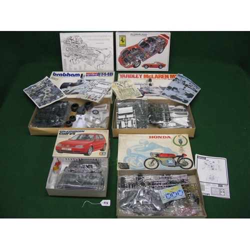 419 - Three boxed Tamiya plastic car kits to comprise: 1:12 scale Martini-Brabham BT44B and Yardley-McLare... 