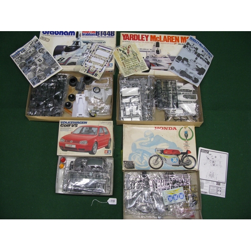 419 - Three boxed Tamiya plastic car kits to comprise: 1:12 scale Martini-Brabham BT44B and Yardley-McLare... 