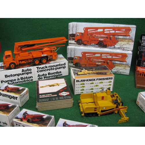 441 - Quantity of metal construction site models made in Germany by NZG and comprising: three truck mounte... 