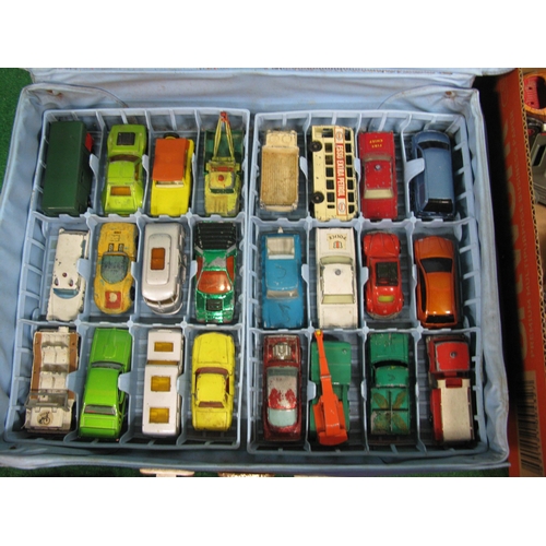 451 - Matchbox carry case with three full baskets and loose larger diecast vehicles all from Corgi, Dinky,... 