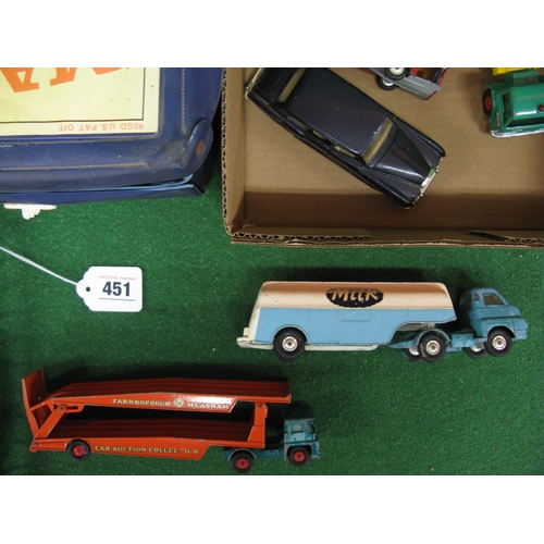 451 - Matchbox carry case with three full baskets and loose larger diecast vehicles all from Corgi, Dinky,... 