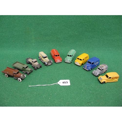 453 - Ten early playworn Dinky lorries and vans to include: two different Kodak vans, ambulance and petrol... 