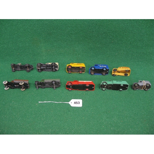 453 - Ten early playworn Dinky lorries and vans to include: two different Kodak vans, ambulance and petrol... 