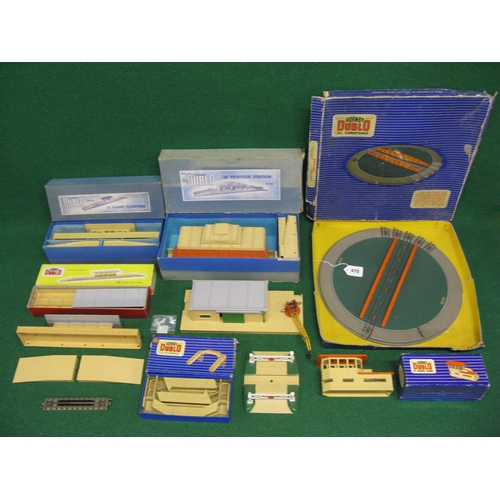 470 - Two boxes of loose and boxed Hornby Dublo accessories to include: stations, platforms, shelters, tur... 