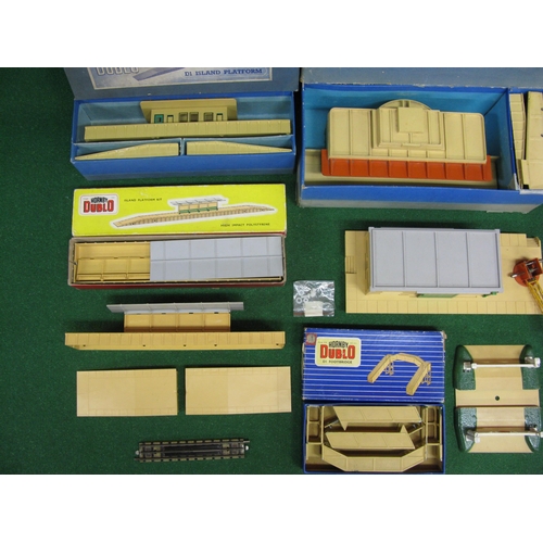 470 - Two boxes of loose and boxed Hornby Dublo accessories to include: stations, platforms, shelters, tur... 