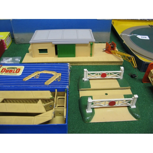 470 - Two boxes of loose and boxed Hornby Dublo accessories to include: stations, platforms, shelters, tur... 