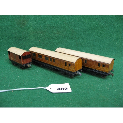 482 - Two 1930's/1940's Trix Twin Railway tinplate gloss teak brake 3rd coaches together with NE brake van... 