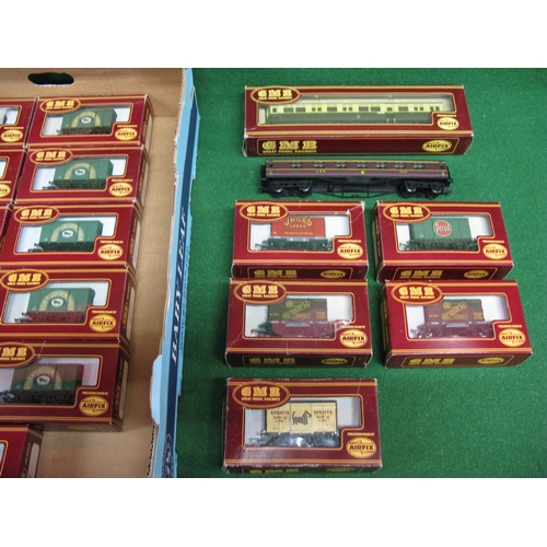 493 - Box of 1970's/1980's GMR OO rolling stock to comprise: eleven Lyles Golden Syrup vans, five other wa... 