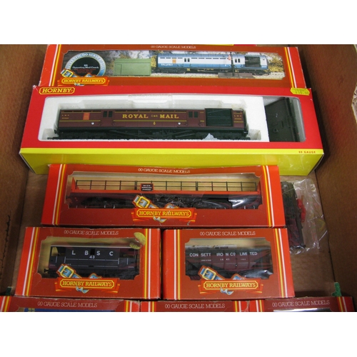 500 - Box of Hornby 00 rolling stock, to comprise: LMS Operating Mail Coach set, car transporter (no cars)... 