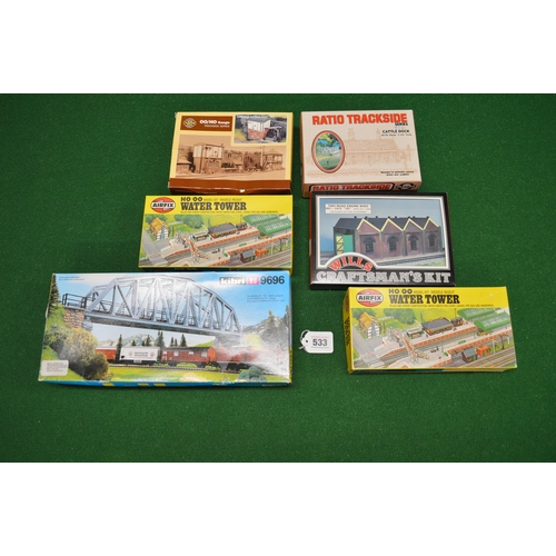 533 - Large quantity of 4mm unmade card and plastic building, bridge, trackside structures and fencing kit... 