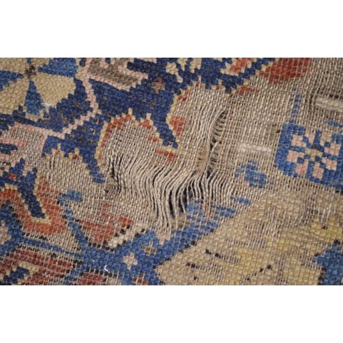 23 - Blue ground rug having cream, red and blue pattern with end tassels - 1.42m x 1.02m together with on... 