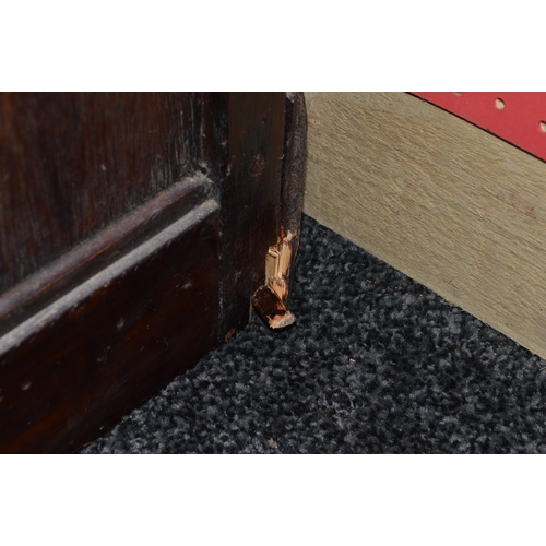 26 - Dudley & Co. mahogany stained haberdashery cabinet having sixteen glazed drawers over two sliding do... 