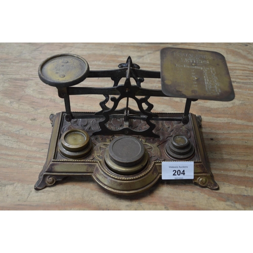 204 - Set of brass ornate desk postal scales and weights - 8.75