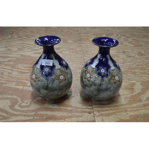 213 - Pair of Royal Doulton pottery vases with flower head decoration - 9.25