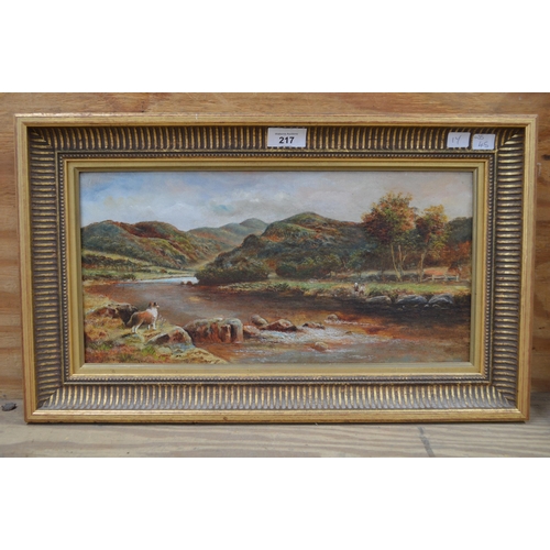 217 - George Nicholls 19th/20th century oil on canvas of dog and figures on river bank - in gilt frame