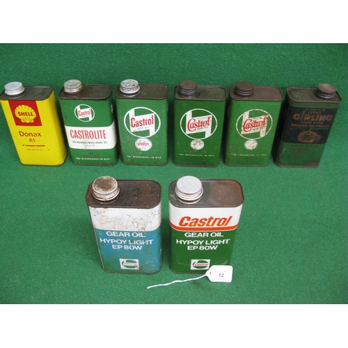 12 - Six x one quart oil tins from Castrol, Girling and Shell together with two x 1 litre tins for Castro... 