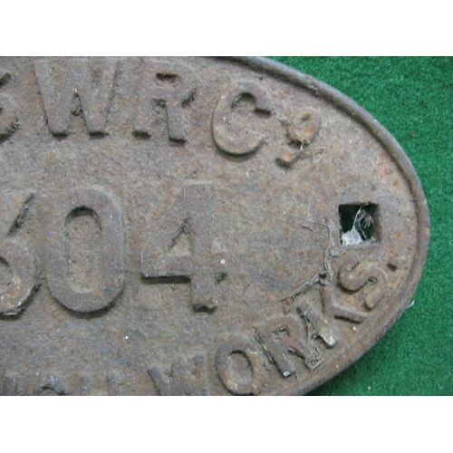 215 - Cast iron oval wagon plate with square mounting holes to read L&SWR Co. 2304 Eastleigh Works, in as ... 