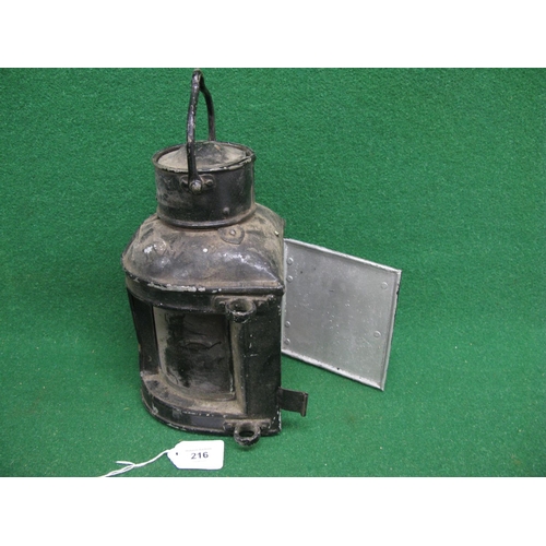 216 - Small lamp with circular side fixing brackets, front plaque reads Launon Lamp Improved Combination, ... 