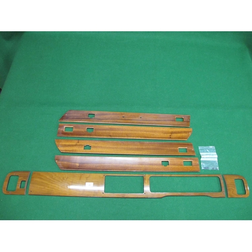 29 - Seven pieces of wooden trim in good condition (make and marque of vehicle unknown)