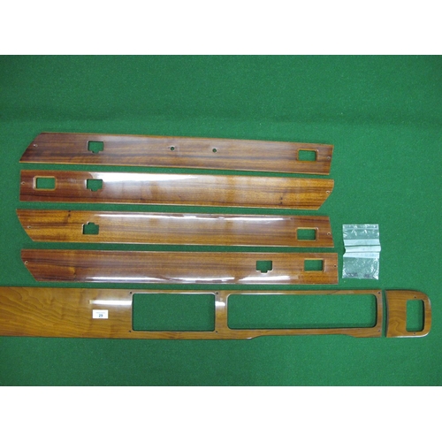 29 - Seven pieces of wooden trim in good condition (make and marque of vehicle unknown)