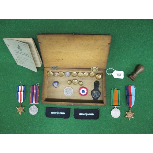 333 - Small wooden box containing: RAF Service And Release book for LAC HJ Vaughan 1/1941-3/46, brass butt... 