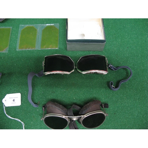 4 - Leather helmet, four pairs of driving goggles and a empty box for Willson (USA) goggles