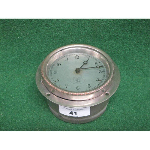 41 - Nickel plated Smiths hinged wind up dashboard clock with 4