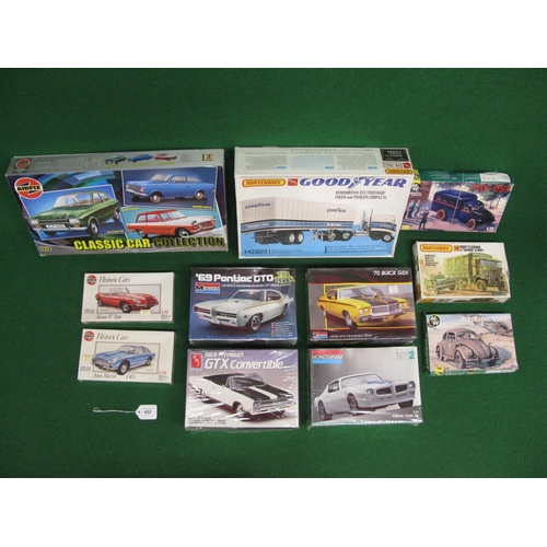 452 - Eleven unmade plastic kits of road vehicles by Airfix, Matchbox, AMT/Ertl, Military wheels and Monog... 