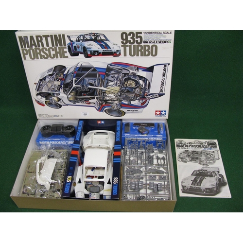 454 - Tamiya (Japan) boxed super detailed 1:12 scale plastic kit of a Porsche 935 Turbo with instructions,... 