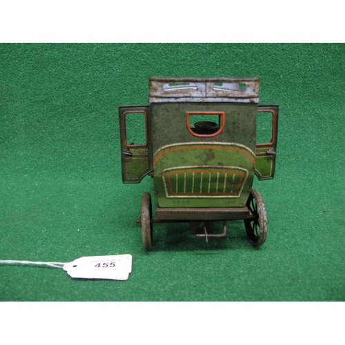 455 - Clockwork tinplate model of a Veteran car with opening rear doors, spoked wheels and roof luggage ra... 