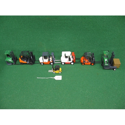 473 - Collection of seven boxed modern fork lift models constructed of metal and plastic in Japan, Spain a... 