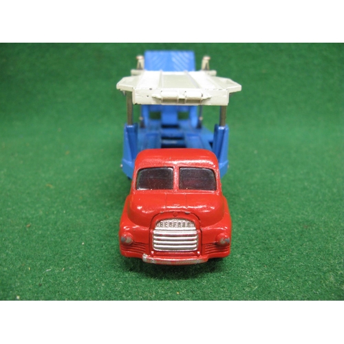 477 - 1957-1962 Corgi-Major No. 1101 Carrimore car transporter with red cab and blue body together with tw... 