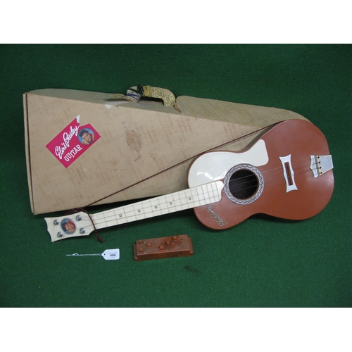 480 - Boxed Elvis Presley guitar with an Auto-Cord accessory, made in England of plastic construction (mis... 